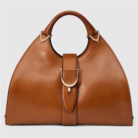 gucci stirrup top handle|Gucci top handle bag vintage.